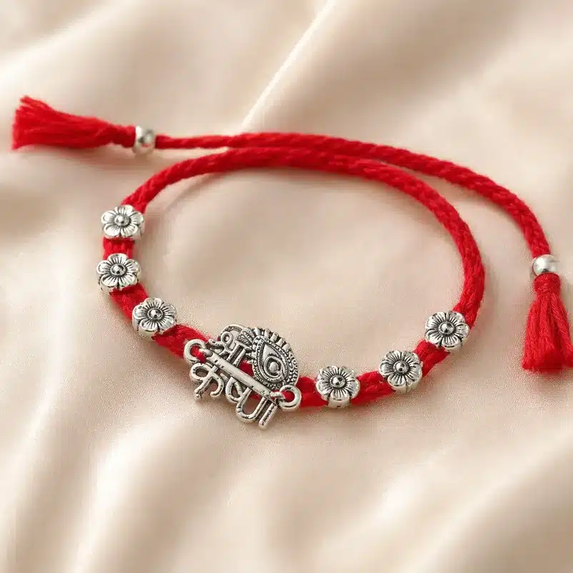 Traditional Silver Plated Rakhi Bracelet with Red Thread